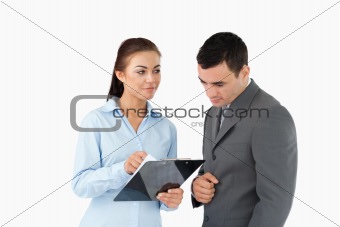Businesswoman explaining data to her partner
