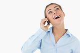 Laughing businesswoman on the phone