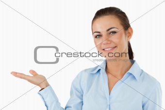 Businesswoman holding something up