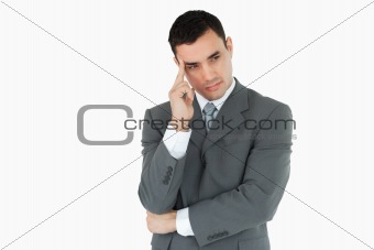 Businessman lost in thoughts