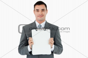 Businessman showing his notes