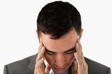 Close up of businessman having a headache