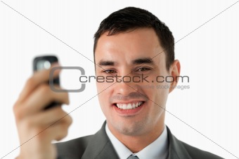 Close up of businessman holding his cellphone