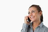Close up of businesswoman on the phone looking diagonally upwards