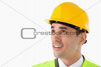 Close up of architect with helmet on looking to the side