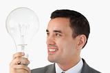 Close up of businessman with huge light bulb