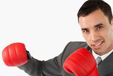 Side view of businessman with boxing gloves