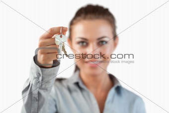 Close up of keys being held by female estate agent