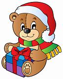 Christmas teddy bear with gift