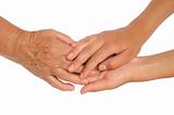 Hands of young and senior women - helping hand concept - clipping path included