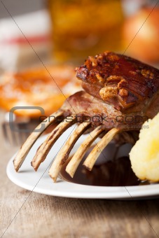 closeup of roasted suckling pig meal 