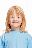 portrait of a boy with long blond hair smiling - isolated on white