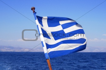 greek flag and the sea