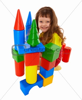 Child built a castle from color cubes