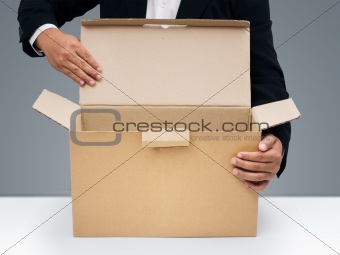Businessmen Open blank brown paper box