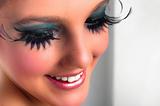 Closeup of a pretty girl with extreme makeup