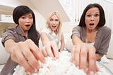 Three Beautiful Women Friends Eating Popcorn Watching Movie at H