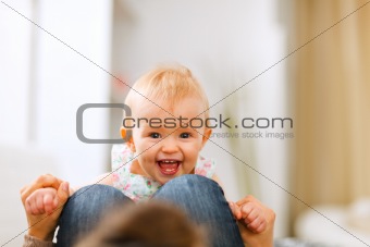 Portrait of smiling playing baby
