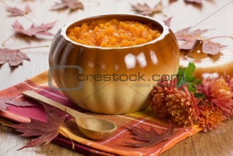 Pumpkin soup in ceramic pot