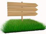Wooden sign on grass