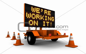 We're Working On It! - Construction Sign