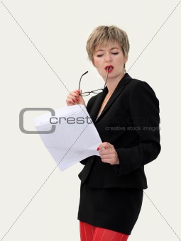 Businesswoman reading a paper