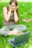 excited girl with laptop