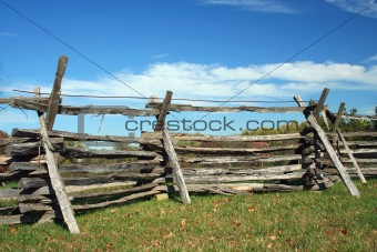 Stacked wood fence