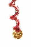 Red New Year's tinsel and gold sphere