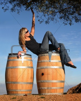 Blond girl in a wine country