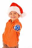 Boy with christmas bauble and santa hat - isolated