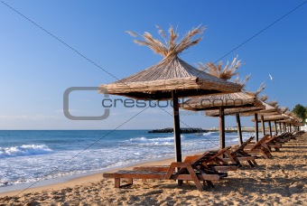 sunchairs and umbrellas on the beach