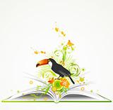 open book with flowers and tropical bird