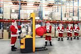 santa clauses in the line for the sacks of gifts in storehouse