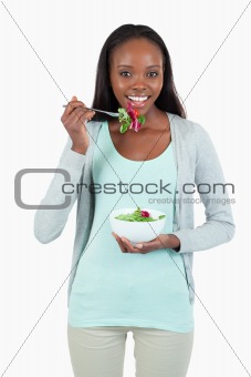 Young woman having a salad