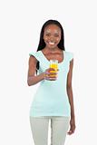 Happy smiling female with a glass of orange juice