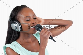 Young woman enjoys singing