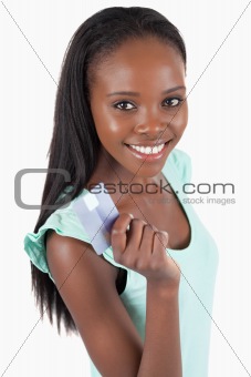 Happy smiling woman with her credit card