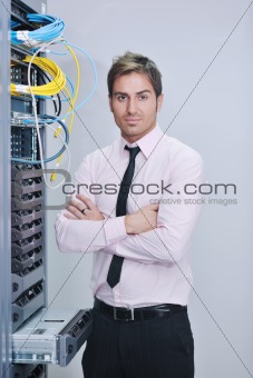 young it engineer in datacenter server room