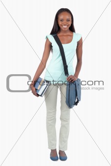 Smiling young student ready for class
