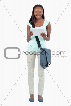 Smiling female student with her notes