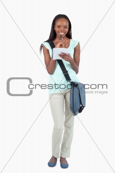 Smiling young student with scratchpad