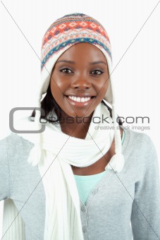 Smiling young woman in winter clothes