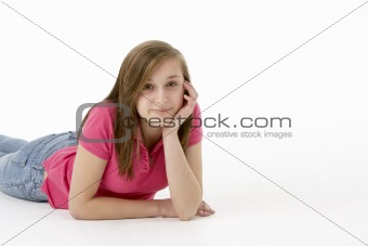 Teenage Girl Laying On Stomach