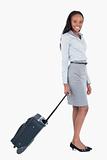 Portrait of a businesswoman with a suitcase