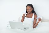 Young woman purchasing online