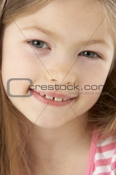 Studio Portrait of Smiling Girl