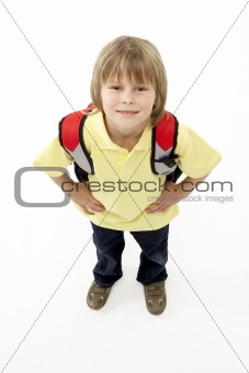 Studio Portrait of Smiling Boy Holding Ruck Sack
