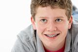 Studio Portrait of Smiling Teenage Boy