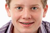 Studio Portrait of Smiling Teenage Boy